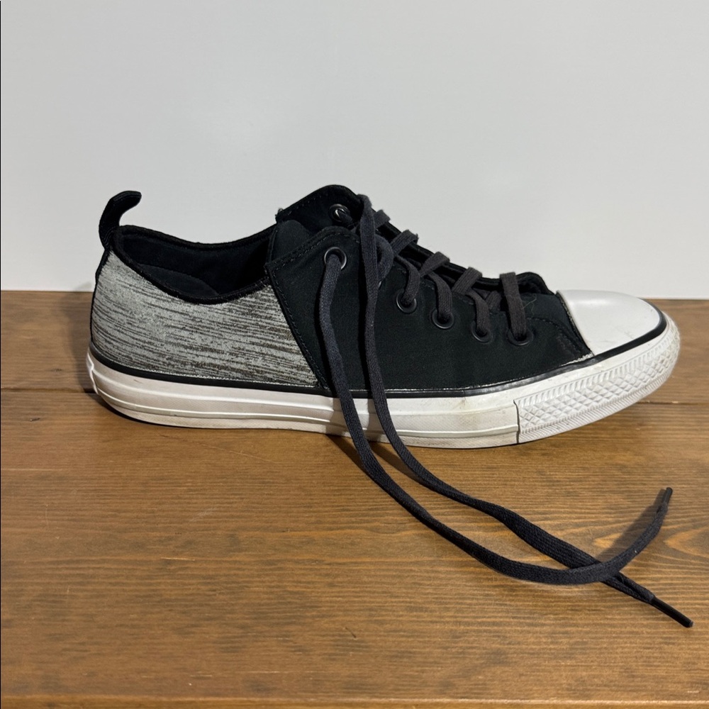 Converse low top black w/white 
stripes size 8 1/2 women’s see photos for heel